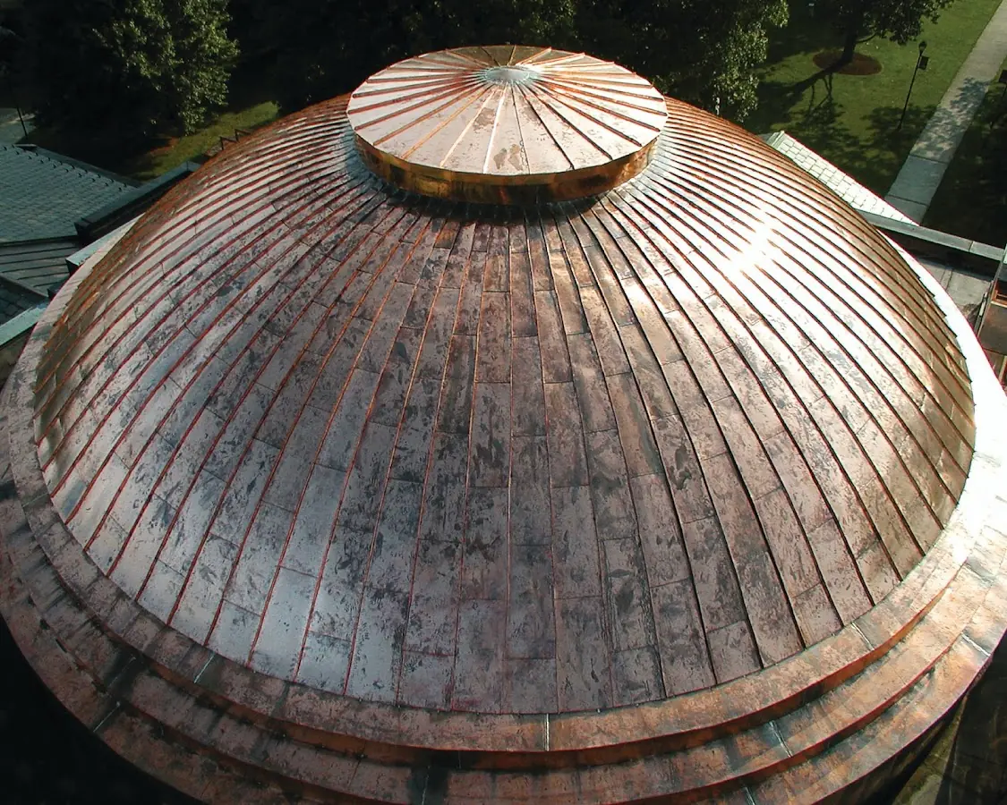 Craftsman Roofing crew installing a new roof in Cedar Valley College